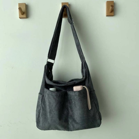 Skulderveske i kanvas - Avslappet og elegant stil 